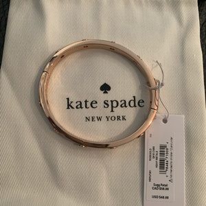 Kate Spade rose gold grommet bangle